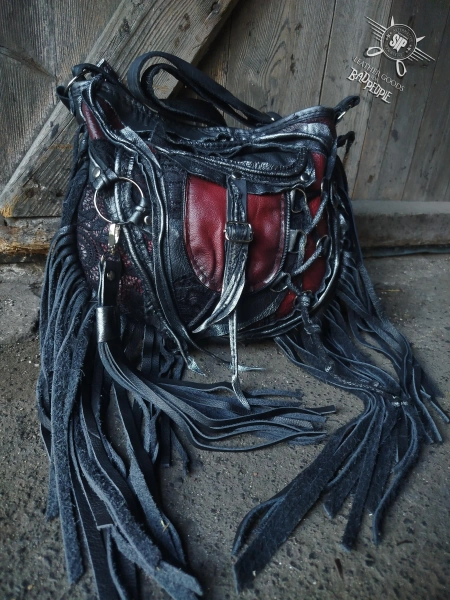 Hobo/crossbody fringed bag in a gothic, witchy, occult, mystic, distressed style, unique, one-of-a-kind, studded, metal rings