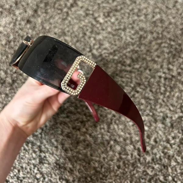 Maroon and gold diamond dolce and gabbana sunglasses...