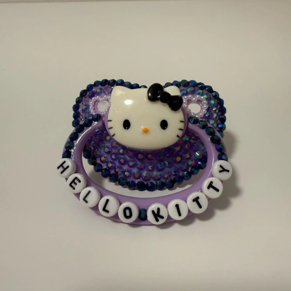 “Sanrio Hello Kitty” Deco Pacifier (Purple) — Itty Bitty Wonders
