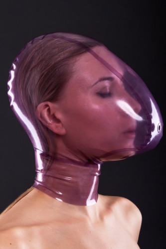 Latex ecstasy mask with a small hole for breath control | Natural