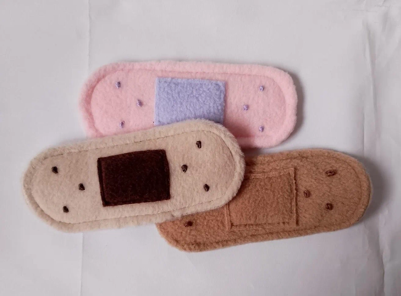 Plush fursuit band-aid plaster prop