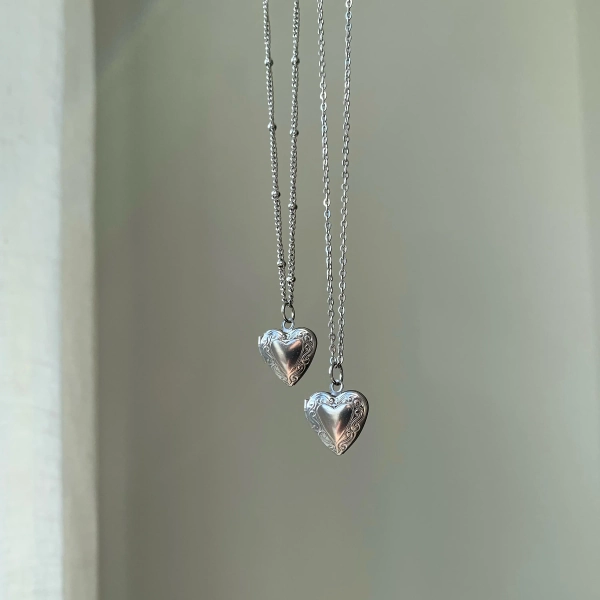 silver heart locket necklace.