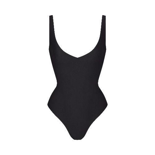 SKIMS BODY UNLINED PLUNGE THONG BODYSUIT | ONYX | XXS