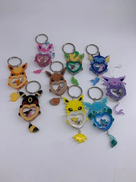 Anime poke heart shaker keychains /Iphone hanger, eeveelution, eevee, pokemon, phone hanger, jolteon, flareon, vaporeon, espeon, glaceon