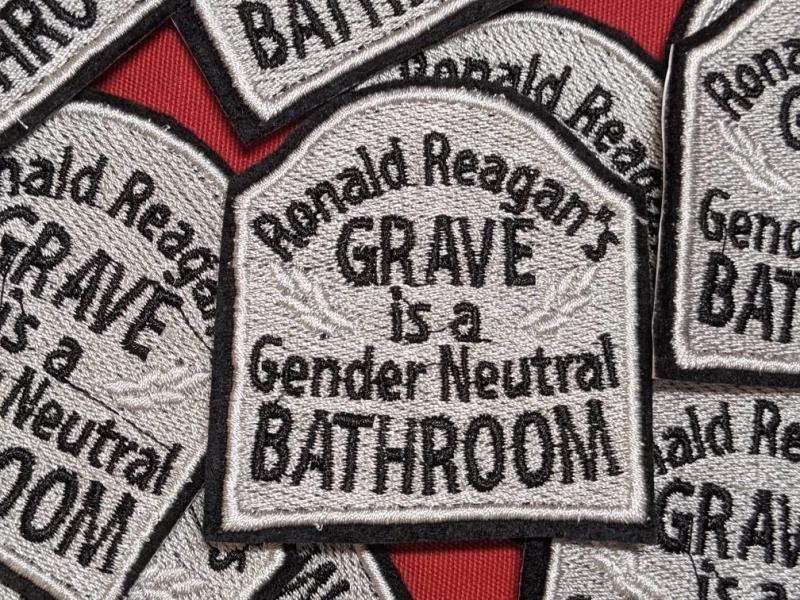 Ronald Reagan's Grave is a Gender neutral bathroom 65mm iron on patch