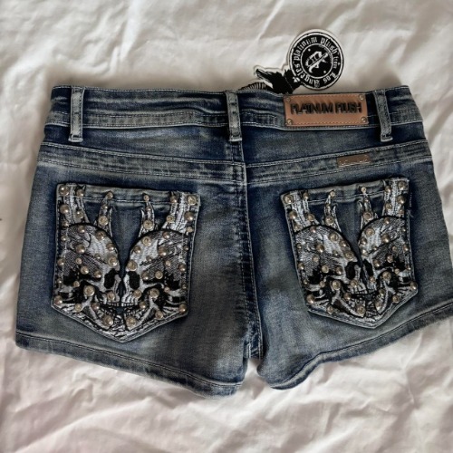 Brand new platinum plush shorts with skulls on...