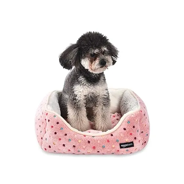 Amazon Basics Kuscheliges Haustierbett für Hund oder Katze, klein, Rosa, Gepunktet, L 47 x B 37 x H 17 cm
