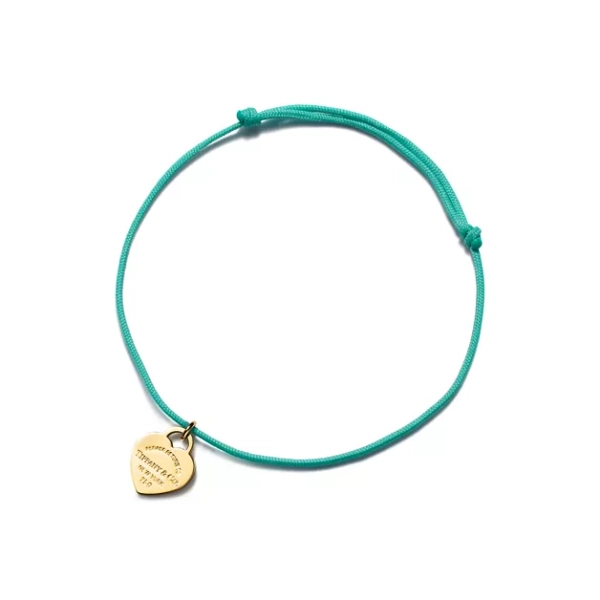 Return to Tiffany™ Heart Tag Bracelet in Yellow Gold on a Tiffany Blue® Cord