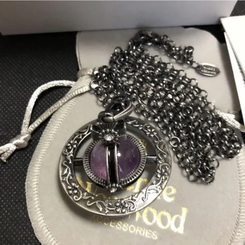 Vivian Westwood gunmetal necklace with purple orb pendant