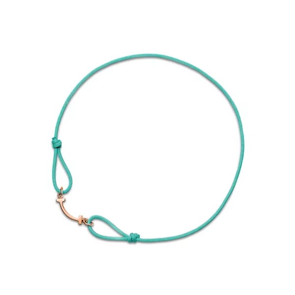 Tiffany T Smile Bracelet in Rose Gold on a Blue Cord