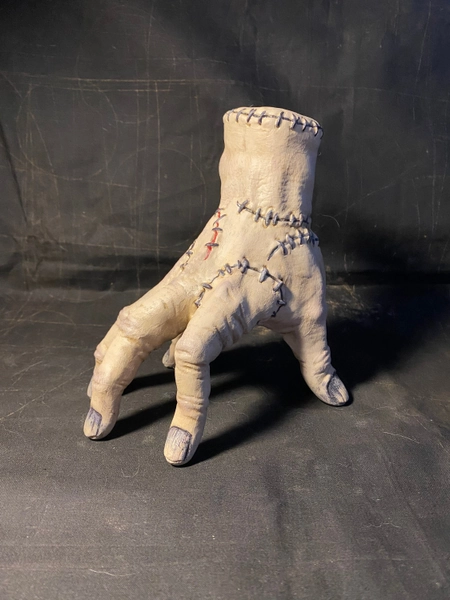 wooden hand Adams family