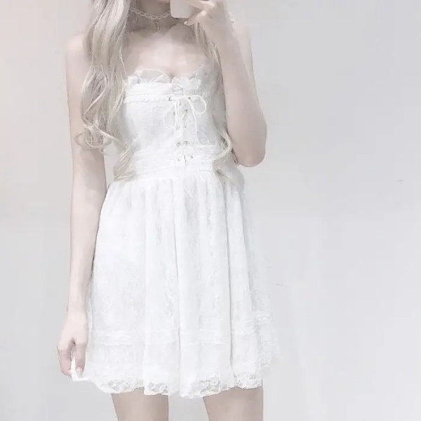 Ethereal White Lace Dress with Ruffles and Bows for a Fairy-Tale Look
