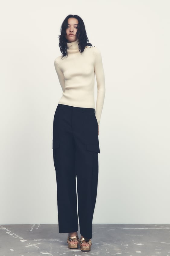 KNIT SWEATER WITH SIDE BUTTONS