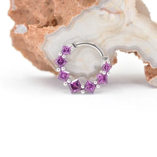 White gold and rhodolite garnet daith ring 