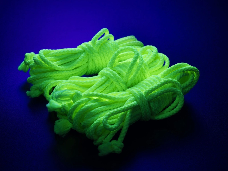 UV blacklight reactive yellow-green bondage rope for shibari and BDSM play. colorful polypropylene. 6mm 1/4" thick. 8m, 4m, 30ft, 15ft