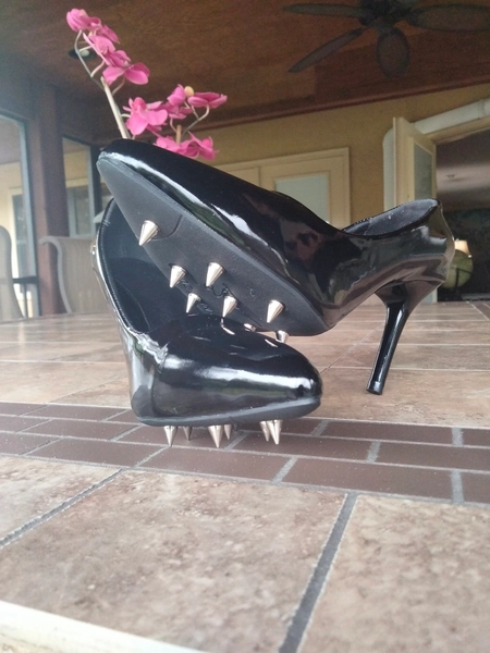 Spiked high heels