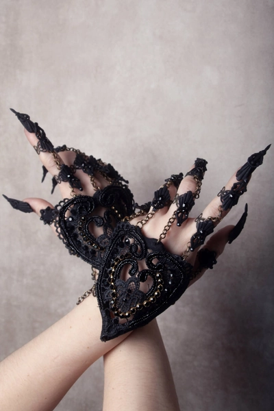 Black beaded hand jewelry