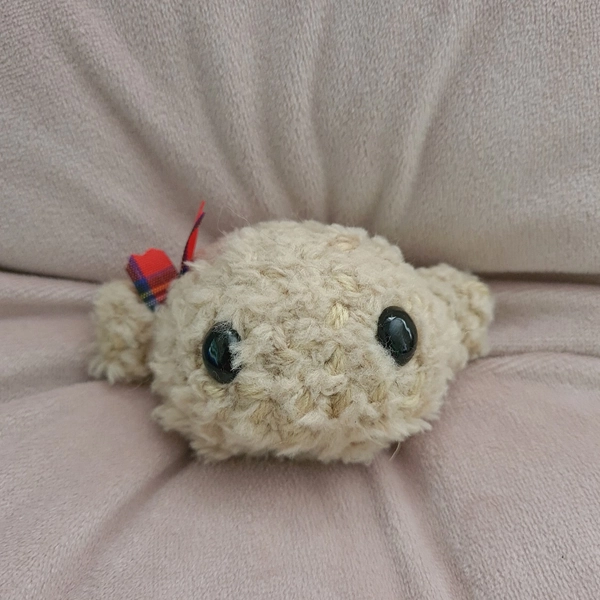 Wee hairy haggis crochet, straight from running around the scottish highlands, beige super soft yarn wee black eyed crochet cutie.