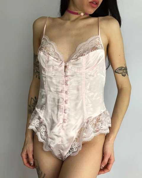 Romantic pastel pink button up bodysuit with lace
