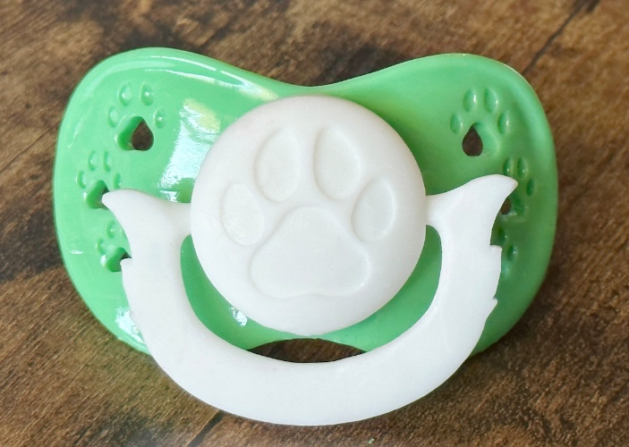 MuteButtons Paw Print Binky 