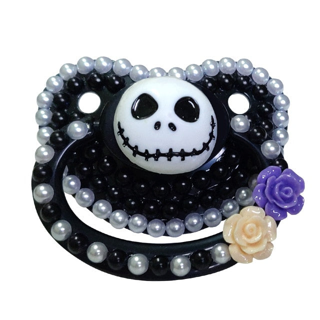 Skelly Deco Pacifier - Skeleton & Flower Handle