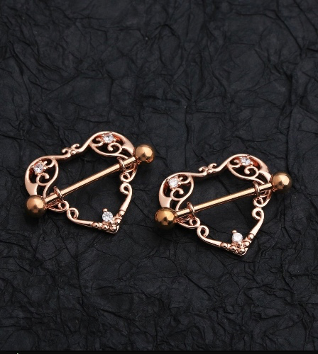 Rose gold nipples piercings 
