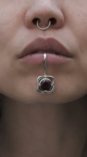 Silver and Red Garnet Lip Ornament 