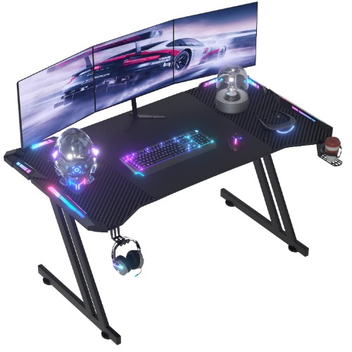 HLONONE 140 x 60cm LED Gaming Bureau Gamer Style Esport Ergonomic Bureau pour Bureau Domicile avec Grand Tapis de Souris Porte Gobelet Support Casque Noir