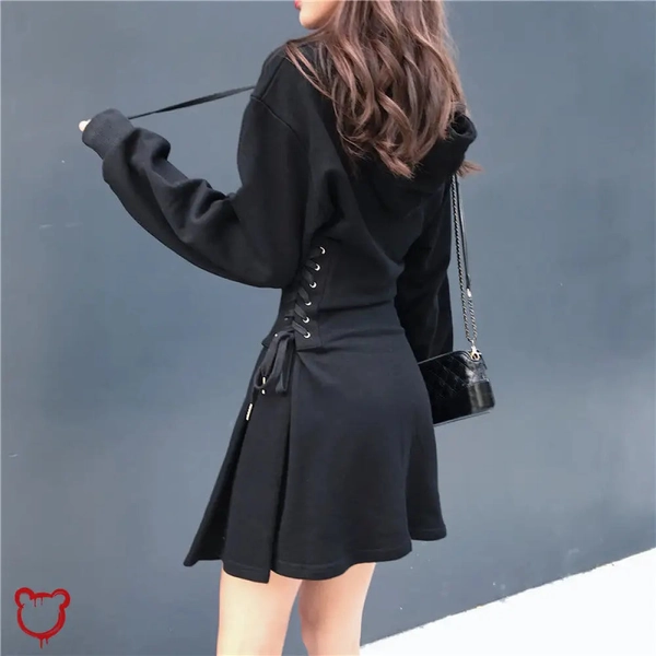 Dark lace-up hooded dress.