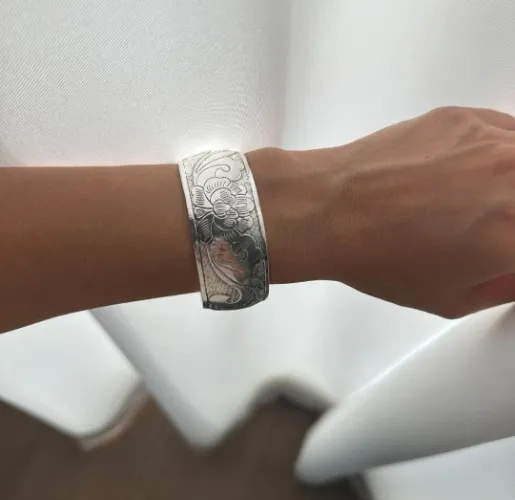 Silver floral bangle