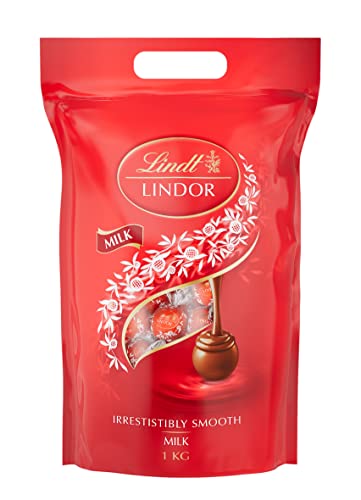 Lindt Lindor Milk Chocolate Truffles Bag | Approx 80 truffles, 1kg | Contains a Smooth Melting Filling | Gift Present or Sharing Box for Him and Her | Christmas, Birthday, Congratulations, Thank you - Milk - 80 Count (Pack of 1)