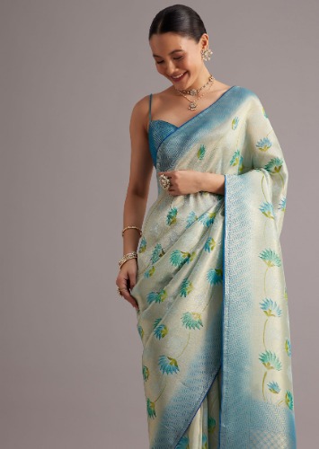 Blue Tissue Silk Saree With Floral Motifs And Contrast Pallu And Border