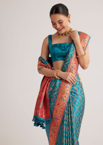 Blue Satin Silk Saree With Jaal Work And Zari Peacock Motif Border