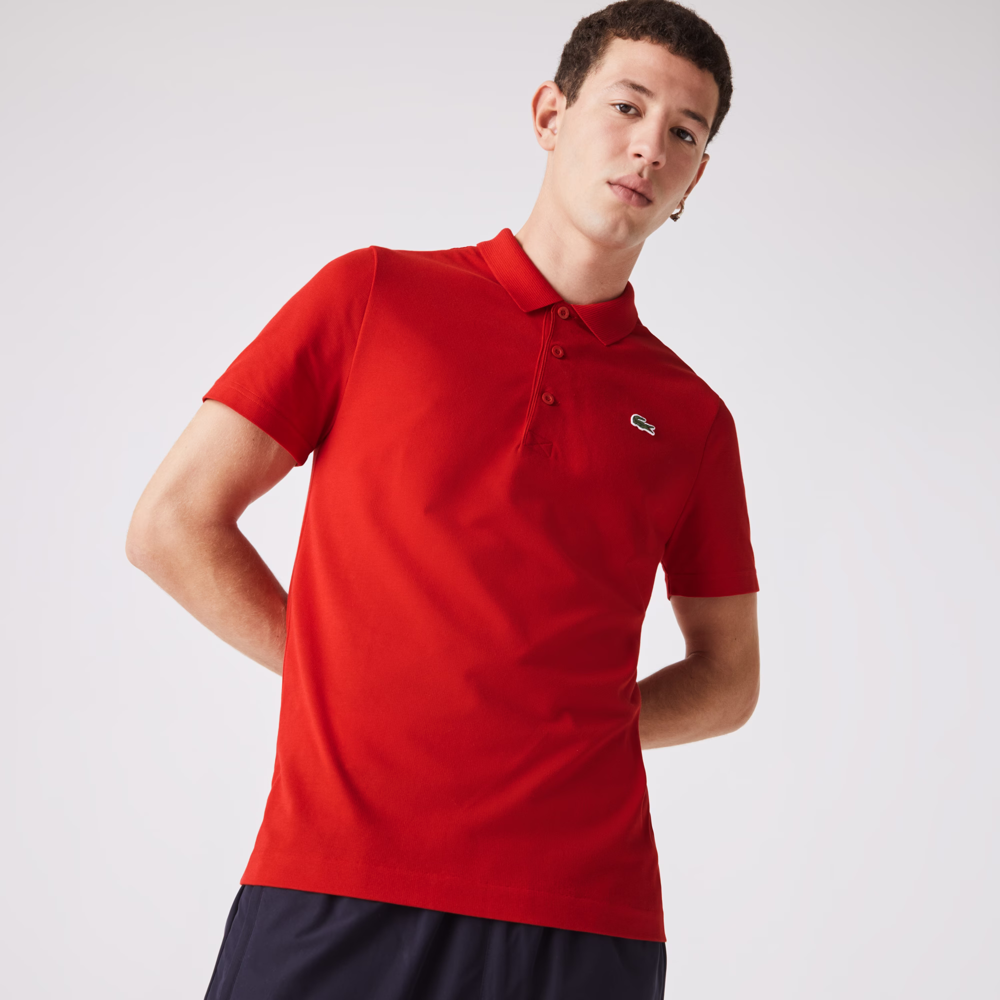 Polo Lacoste SPORT en coton mélangé uni