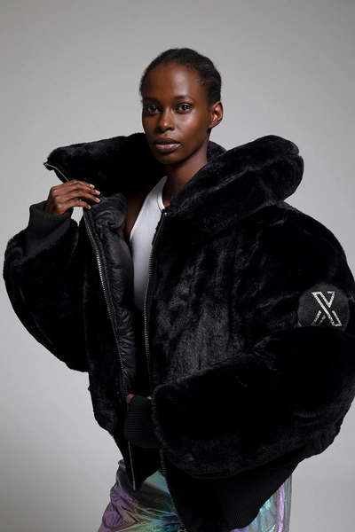 Sultana, a giant plush coat adorned with Swarovski crystals