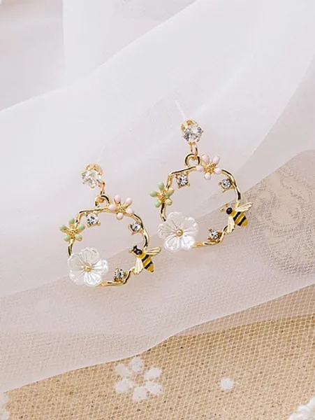 Kreisförmige Ohrringe mit Blumen und Bienendekor