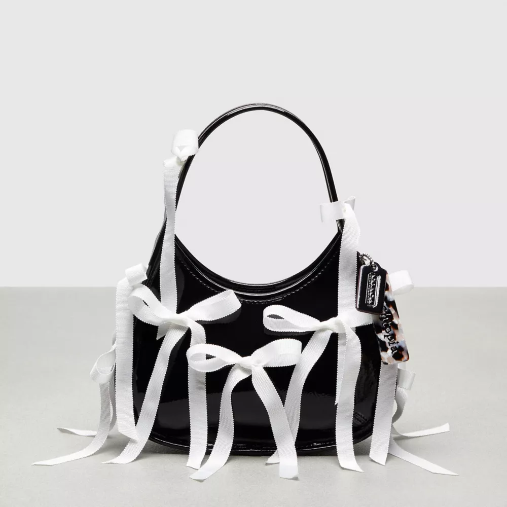 Ergo Bag In Crinkle Patent Coachtopia Leather With Bows All Over