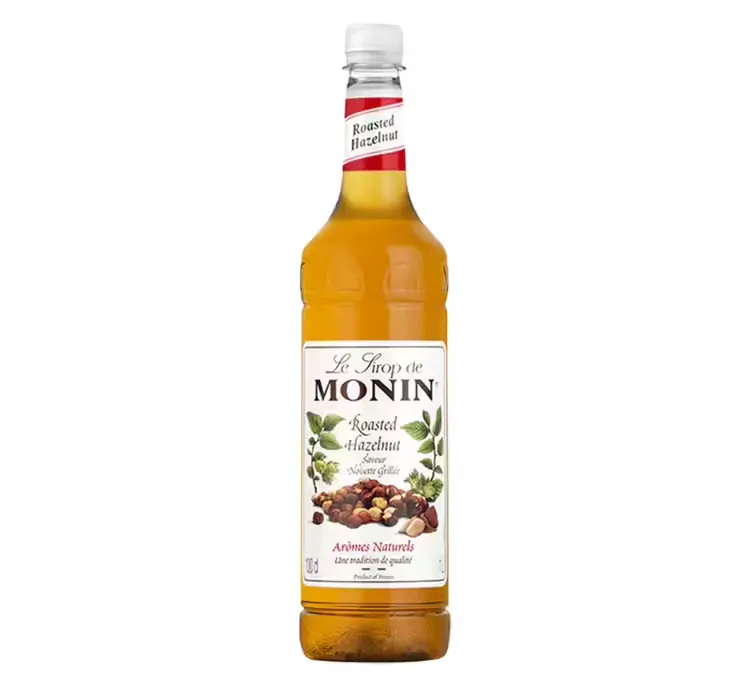 MONIN - Sirop Saveur Noisette Grillée - Pour Café, Chocolat Chaud, Capuccino ou Latte - Arômes Naturels - Bouteille en Verre - 70 cl - Roasted Hazelnut - 700 ml (Lot de 1)