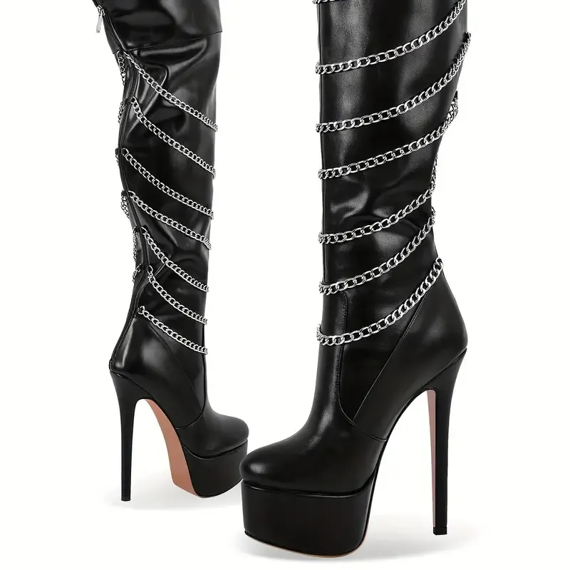 Leather boots with chains