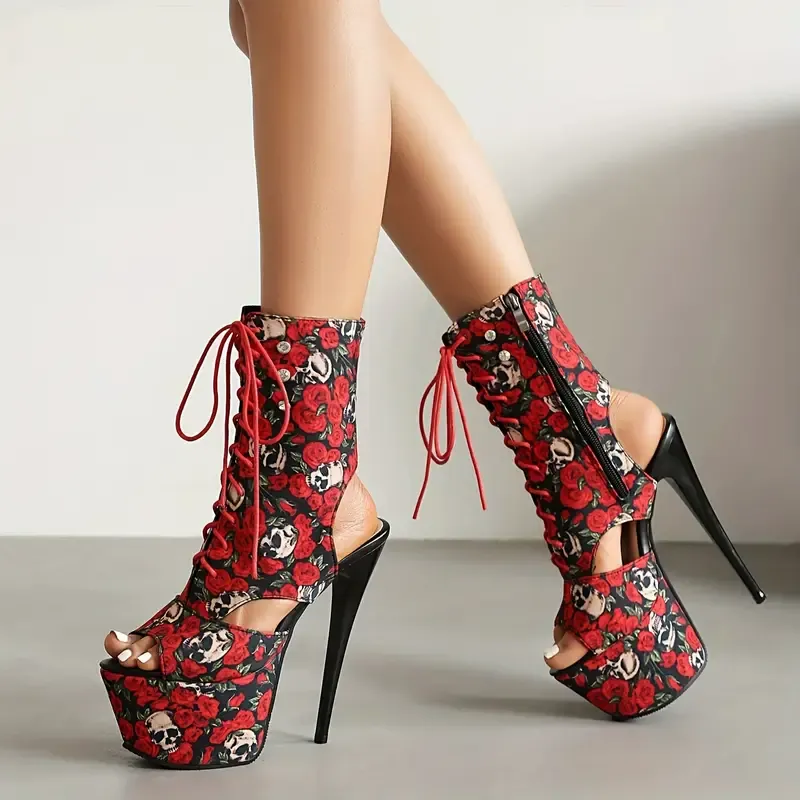 Skull-adorned stiletto platform boots 