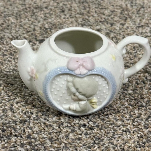 Precious moments white medium sized teacup 

No...