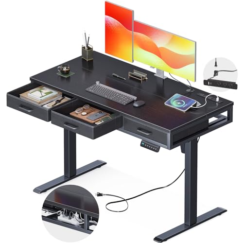 Adjustable desk with drawer's