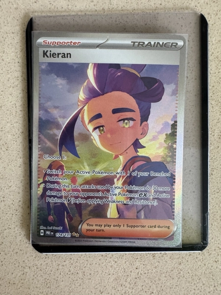 Pokemon TCG Prismatic Evolutions Kieran 174/131 Special Illustration Rare Card