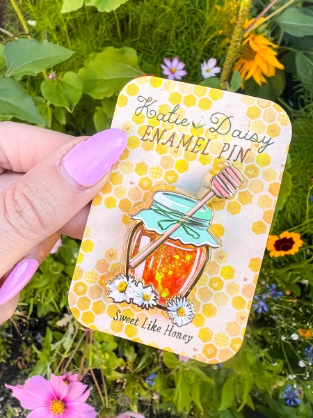 Interactive Honey Jar Enamel Pin with liquid glitter