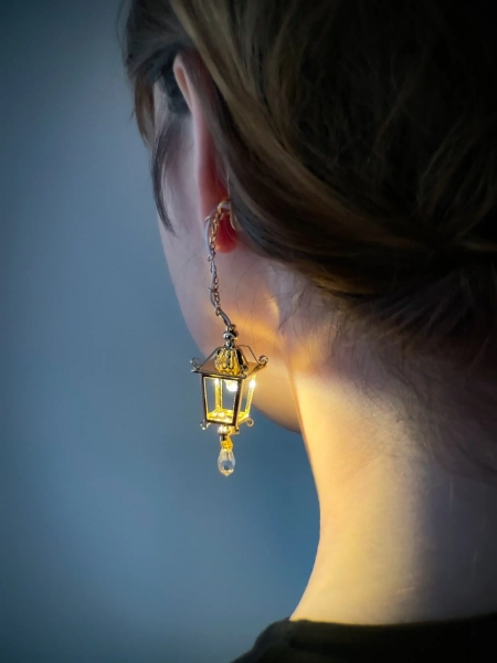 'steampunk' light-up lantern earrings in gold — Diana Caldarescu
