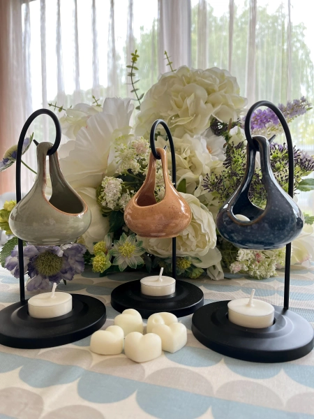 Contemporary Metal Spiral and China Bowl Wax Melt & Essential Oil Tear Drop Style Burner comes with my T-Light and Two Wax Melts.