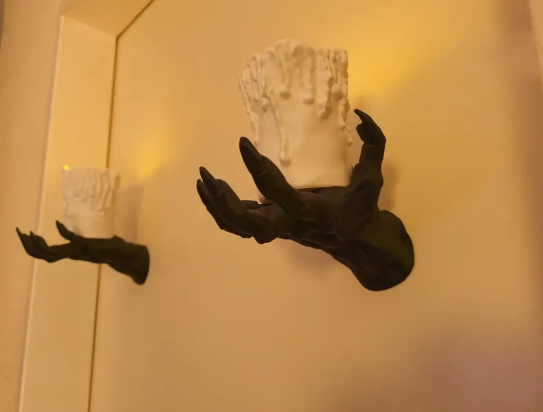 Creepy demon hand candle holder