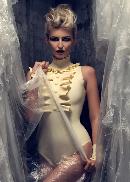 Latex Bodysuit Felice high neck ruffle, in White. Cover buttons. Lingerie. Matching cuffs are also available.