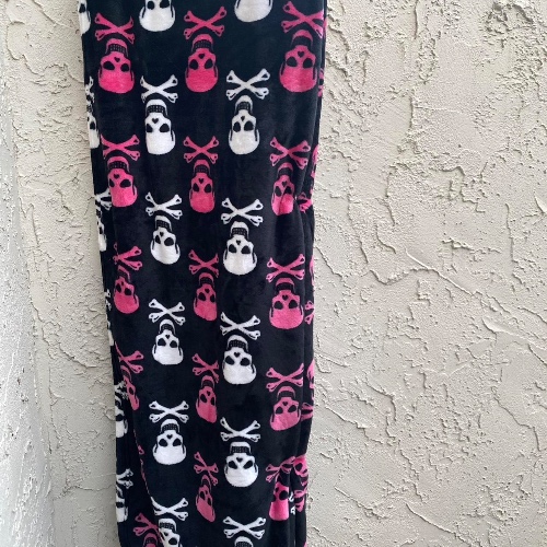 Betsey Johnson skulls and crossbones throw blanket