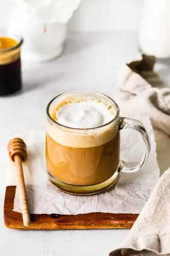Honey almondmilk flat white hot coffee